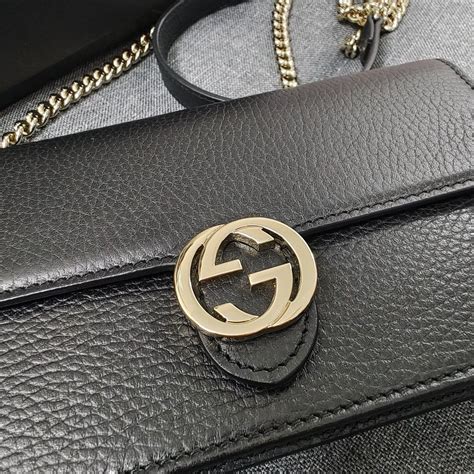 gucci interlocking woc size|gucci leather suitcase.